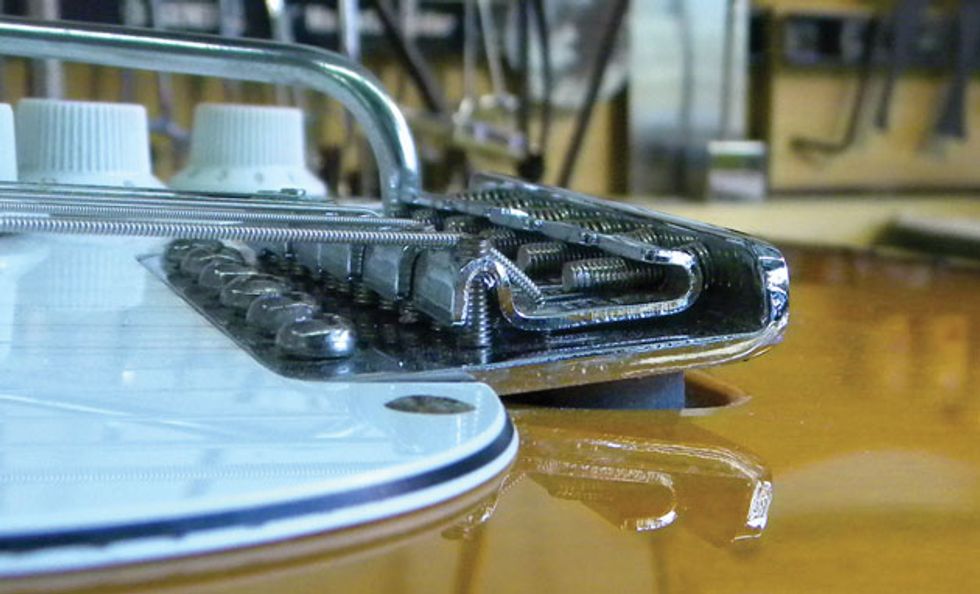 Guitar Shop 101: “Decking” a Stratocaster Trem - Premier Guitar