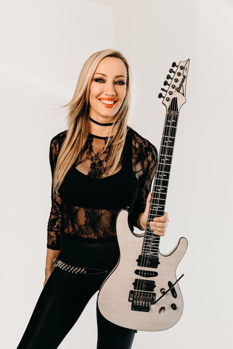 Rock guitarist Nita Strauss has a new solo album and a Rams Super